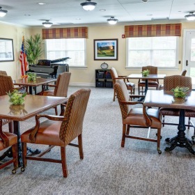 a room with tables and chairs