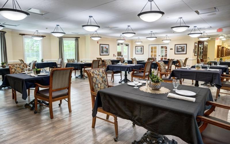 a large room with tables and chairs