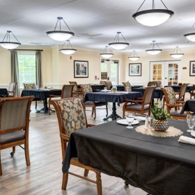 a large room with tables and chairs