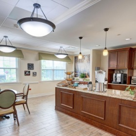 a kitchen with a wood floor