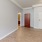 a hallway with white doors